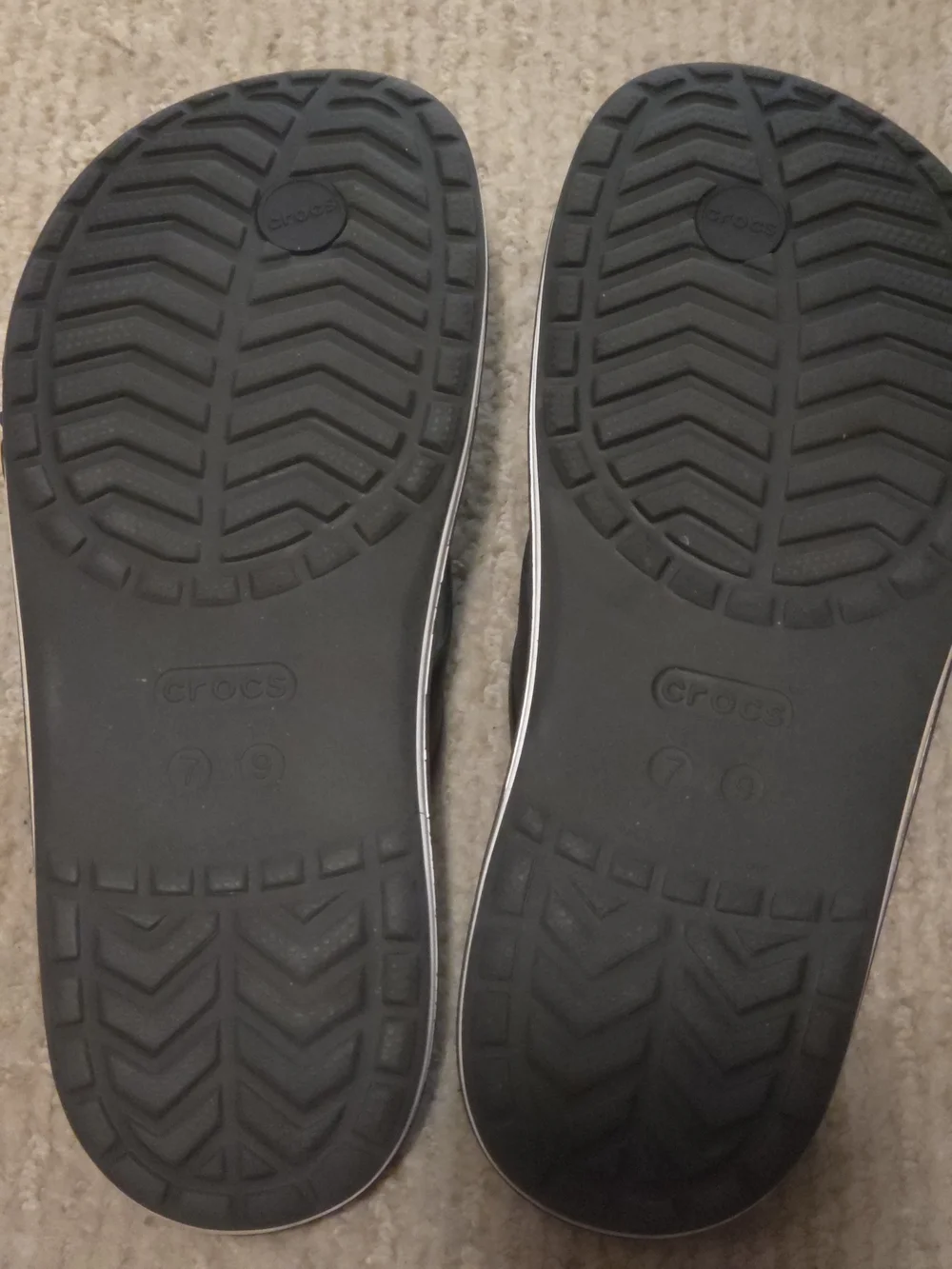 CROCS Men’s Black & White Logo Flip Flops